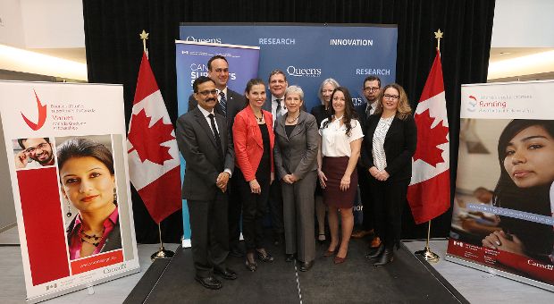 Group photo of politicians, administrators, and researchers.