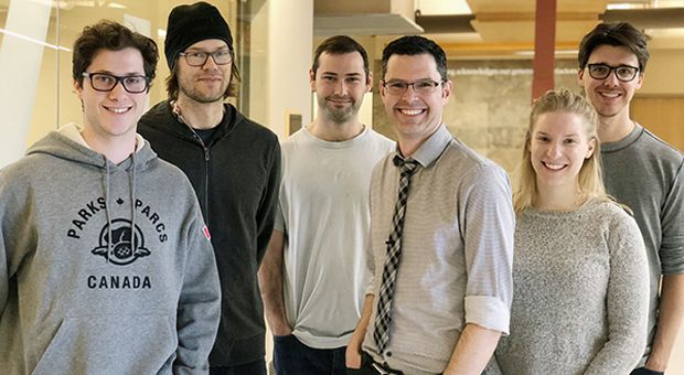 a group of researchers in a lab 