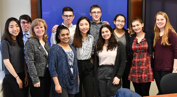 Schulich Leader Scholars at Queen's gather for a photo with Karen Bertrand, Vice-Principal (Advancement)