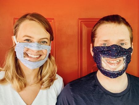 Taylor Berdell and Matt Urichuk in their masks 