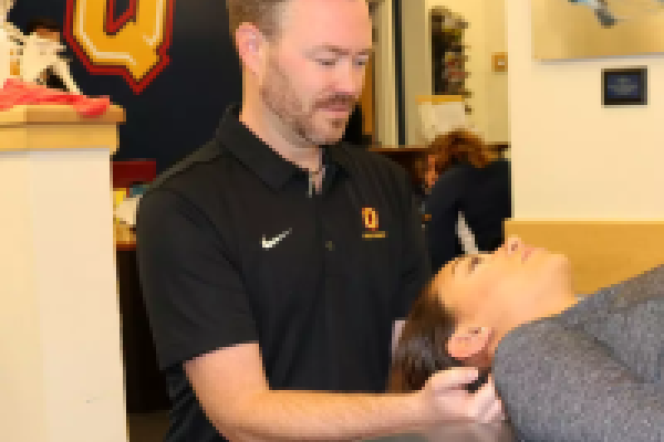 Athletic therapist providing care to a patient in the Q Sports Medicine clinic.