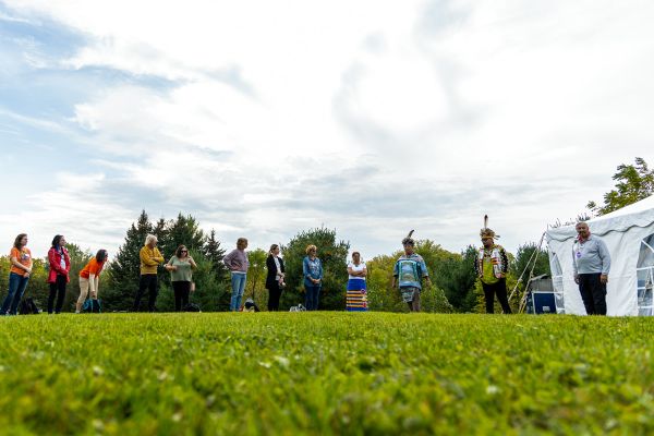 Mile in Their Shoes participants with Indigenous guides and Knowledge Keepers at in-person day in 2023