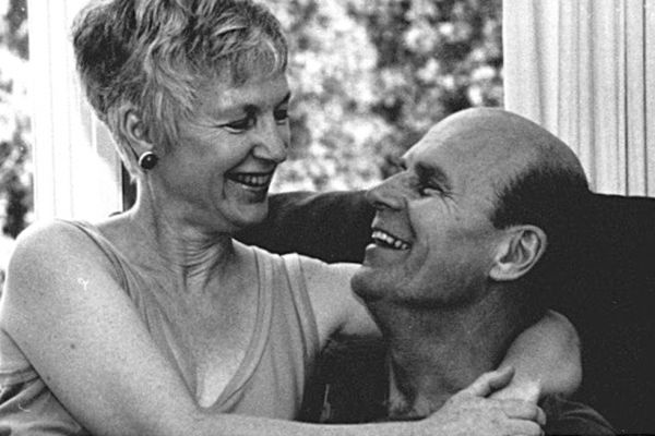 Jim Bennett, right, with wife, Barb, left smiling at each other