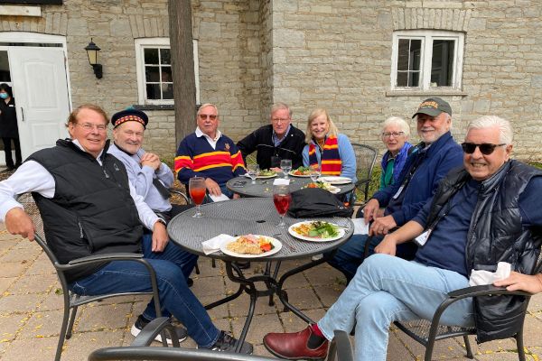 Members of Arts,Com,PHE'71 enjoying a meal together