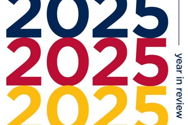 A graphic displaying the year 2025 three times in vertical alignment - one blue, one red, one yellow - with the words "year in review" displayed in smaller text on the side.