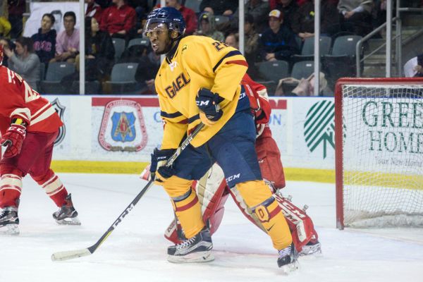 Jaden Lindo playing for the Queen's Gaels hockey team. Photo Credit is Jason Scourse.