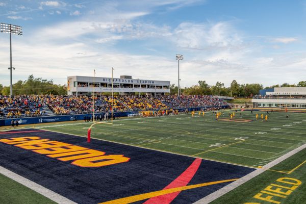 A panoramic view of Richardson Stadium, showcasing a football field and seating for spectators.