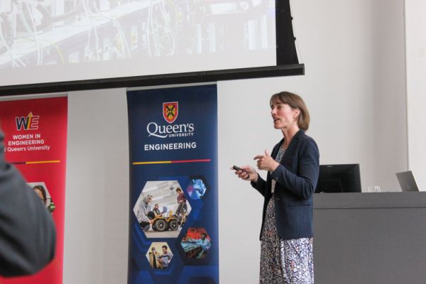 Caroline Hargrove giving a lecture at Queen's.