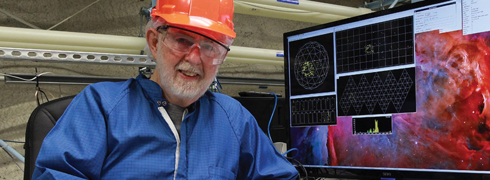 Art McDonald smiles while wearing a hard-at and safety goggles.