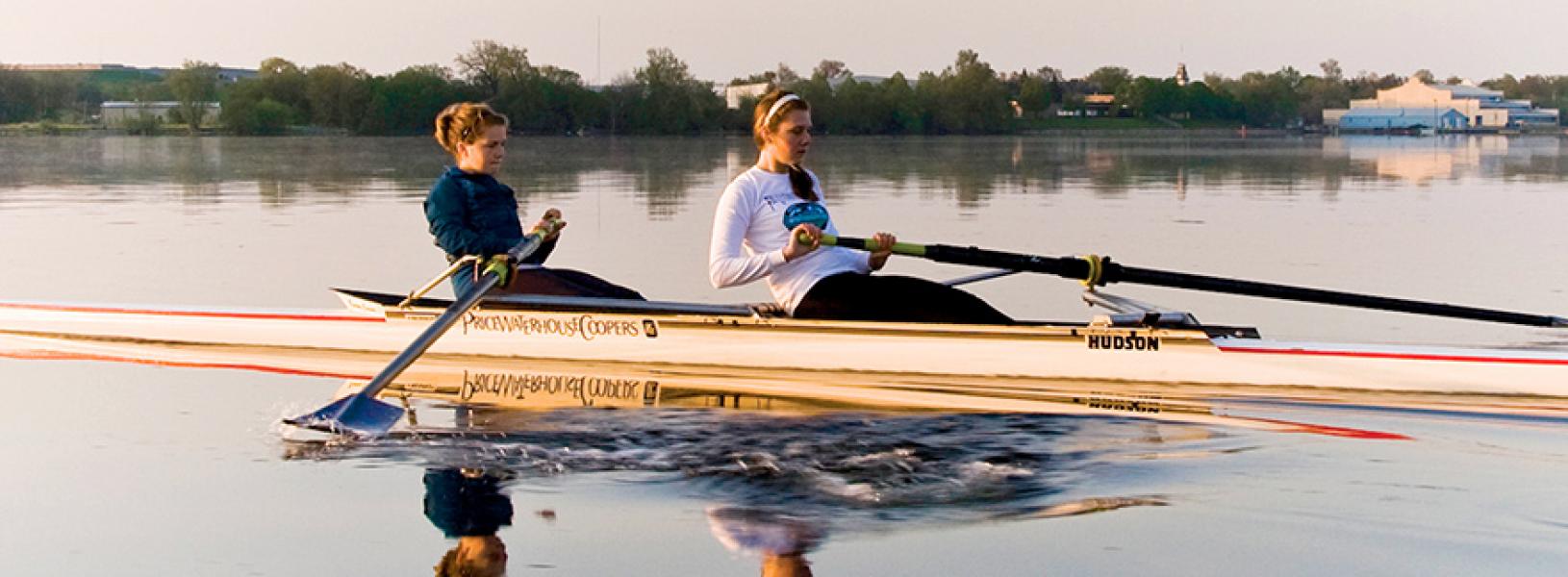 Two students rowing on Lake Ontario