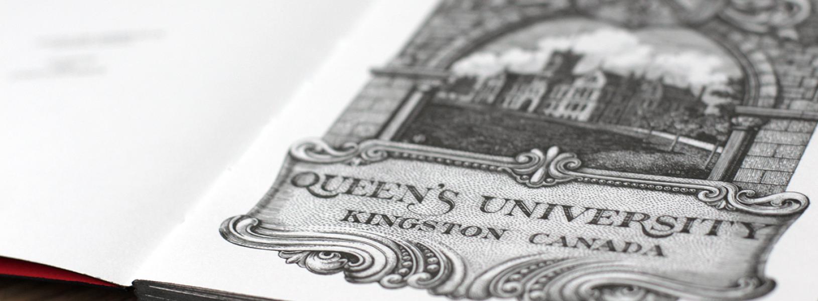 Notebook opened to the first page of an illustration of the university.