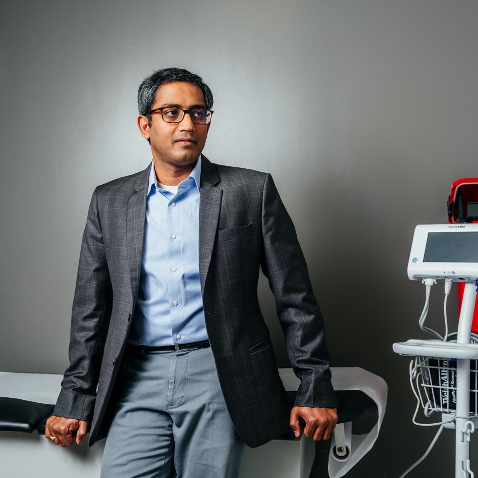 A person sits at a desktop using a webpage.