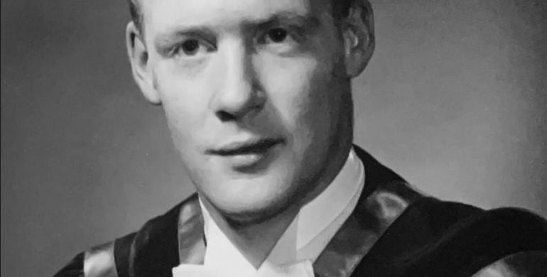 Black and white graduation portrait of Michael Davies
