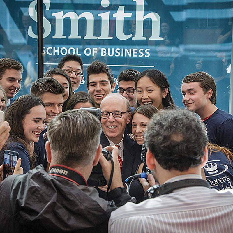 Stephen Smith and students smile for the cameras at the Oct. 1 event