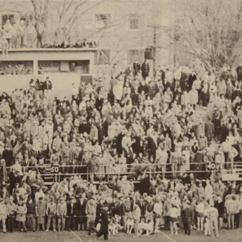 Black and white photo of the crowd watching the 1955 Yates Cup game at Richardson Stadium.