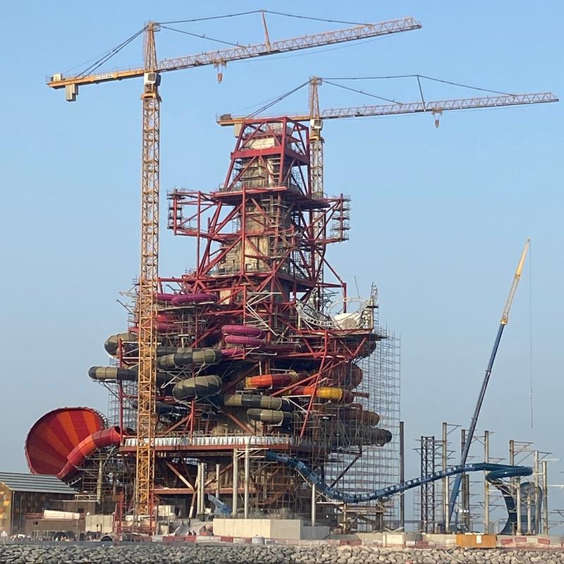 A tall waterslide tower being constructed in Qatar