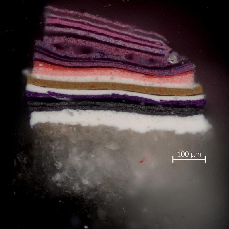 Microscopic cross-section revealing colourful layers of acrylic paint from the artwork Free Fall.