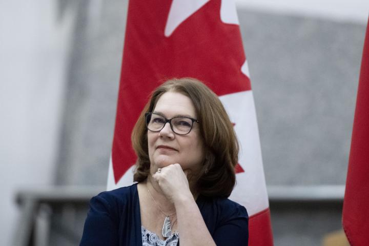 In this 2019 photo, Dr. Jane Philpott waits to deliver a keynote speech at an International Women's Day event at Ottawa  City Hall.