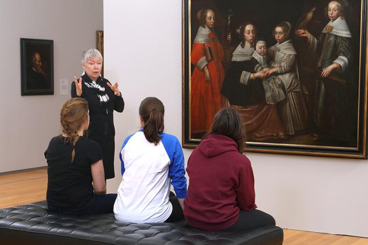 Pat Sullivan discusses the art of observation with three students
