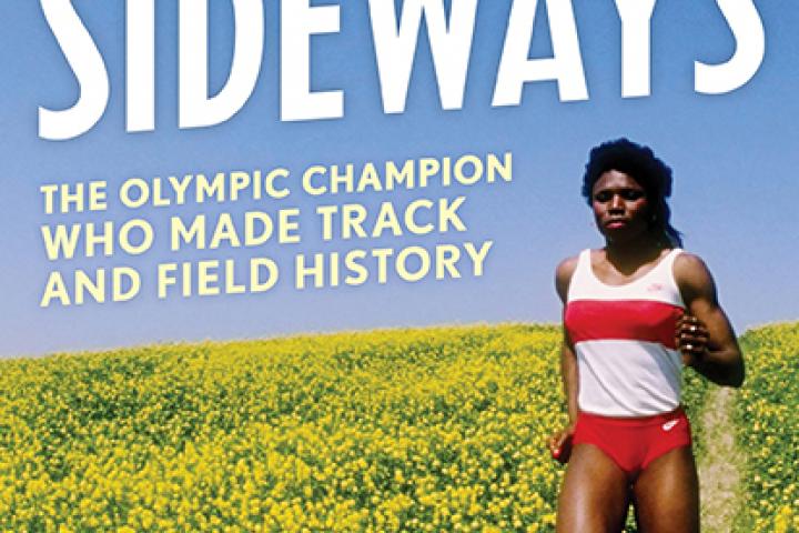 Book cover – woman in a tank top and red shorts is running in a field of yellow flower