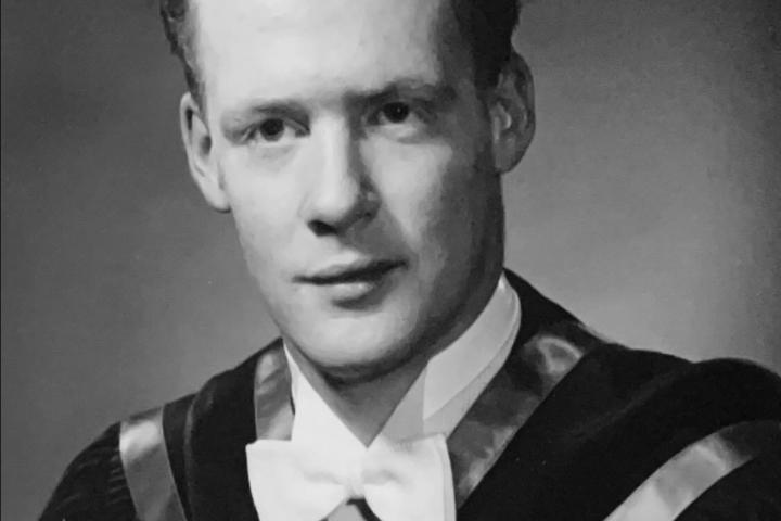 Black and white graduation portrait of Michael Davies