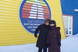 Two people outside in the snow