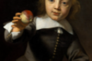 A person holding an apple