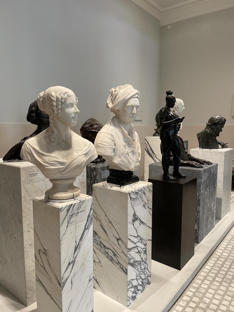 Busts and sculptures in the entrance of the National Portrait Gallery, including Thomas J. Price, Reaching out, 2020. Photo: Allison Morehead.