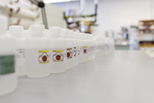 Lots of bottles of cleaning agent components