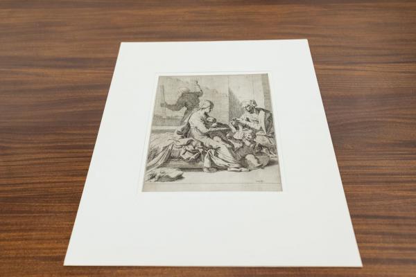 A piece of art featuring two people seated talking