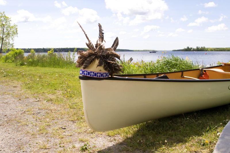 canoe with headdress