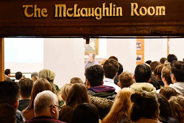 Hundreds of Queen's community members fill McLaughlin Hall in the JDUC to remember student Amir Moradi and the victims of the plane crash in Iran. (Communications Staff)