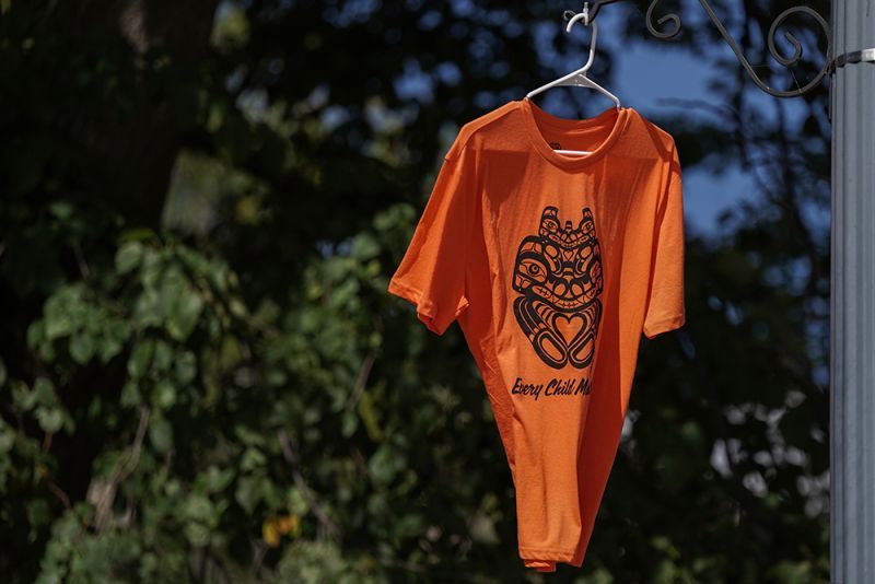 One of several orange shirts that were displayed on the lampposts lining campus' University Avenue.