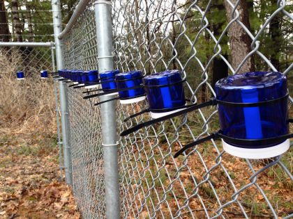 Devices for monitoring mercury tied to a fence
