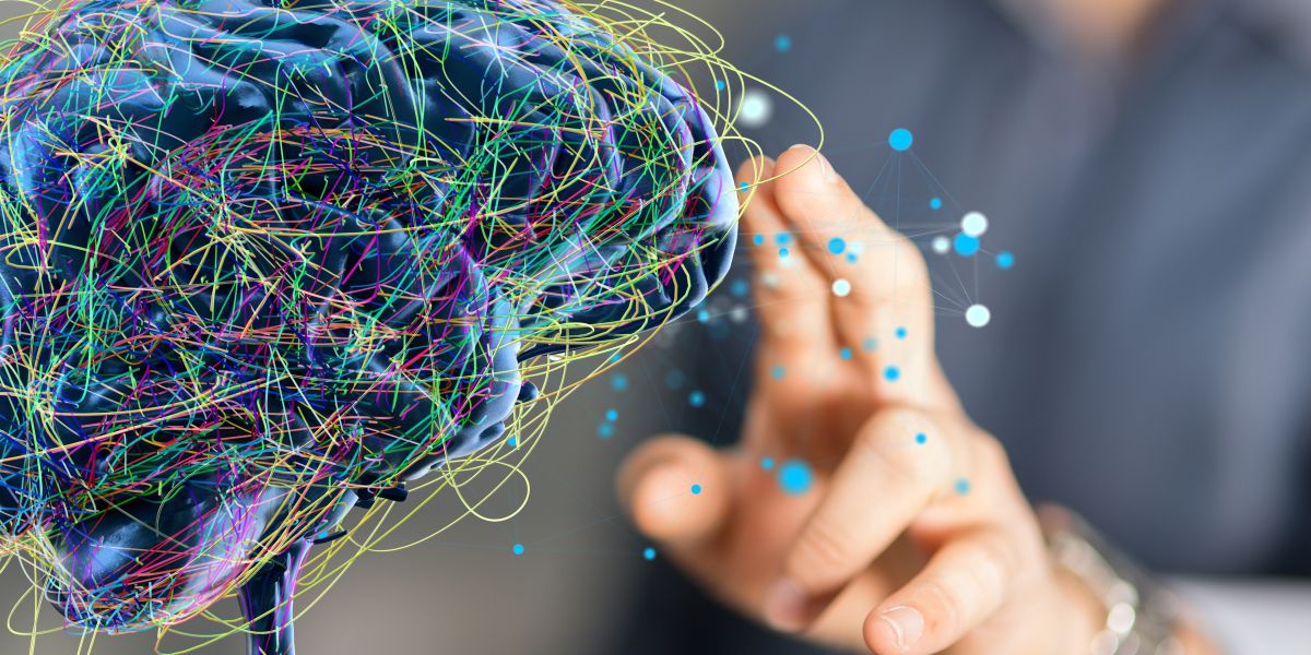 Animated brain with fingers pointing to it.
