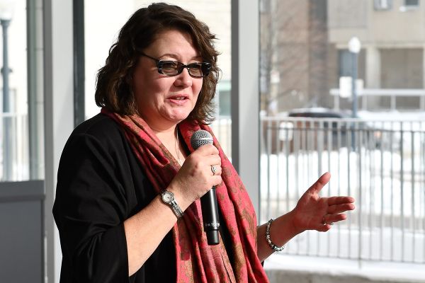 Heather Stuart speaking in to a microphone