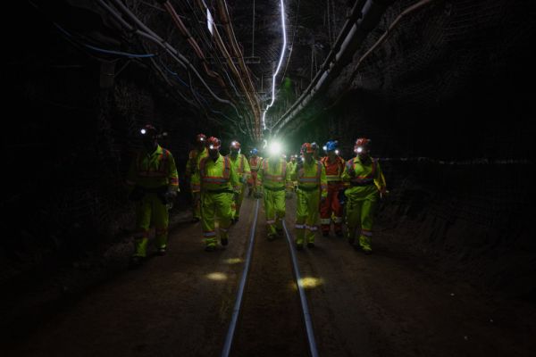 Dr. Nancy Ross, Vice-Principal (Research) accompanies Queen's Emeritus Professor and Nobel Laureate Arthur McDonald, Minister François-Philippe Champagne, local Members of Parliament, and SNOLAB administration on their way to the facility 2 km underground to announce the Canada Foundation for Innovation's 2022 Major Science Initiatives Fund. [Credit: Gerry Kingsley; CFI]