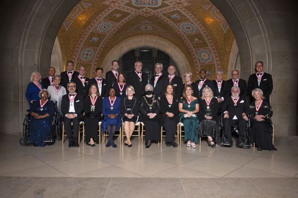Lieutenant Governor and Chancellor of the Order of Ontario Elizabeth Dowdeswell (middle bottom row) invested the newest recipients into the Order of Ontario during a ceremony on Nov. 21. (Photo courtesy of the Office of the Lieutenant Governor of Ontario.)