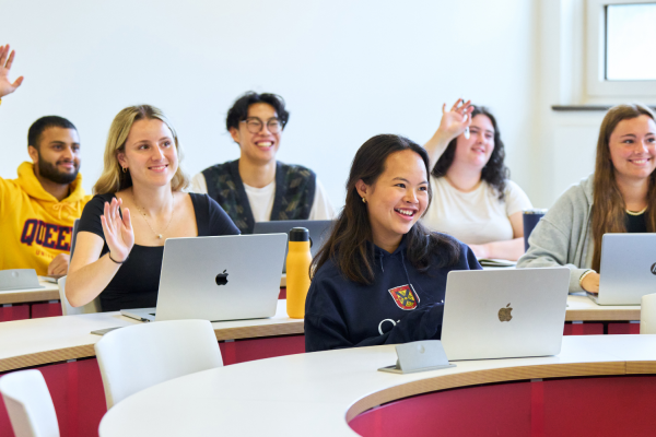 Queen's students in a classroom.