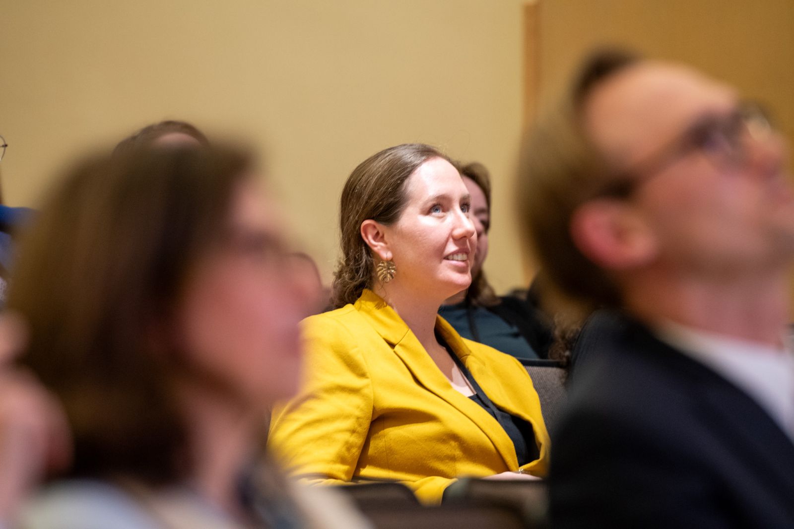 Participant in the audience.
