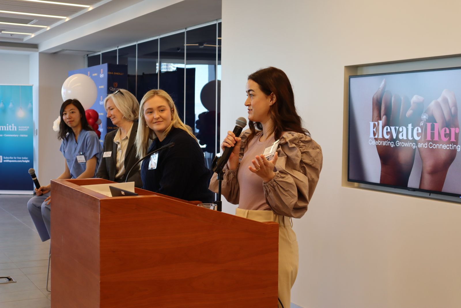 Erica McIlquham speaking at ElevateHer