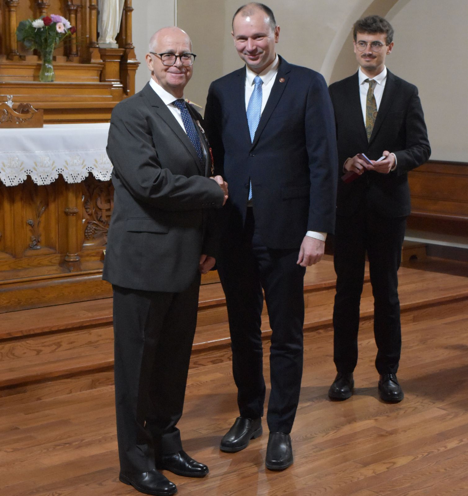Gregory Jerkiewicz receiving The Cross of Freedom and Solidarity from the Polish Ambassador to Canada.