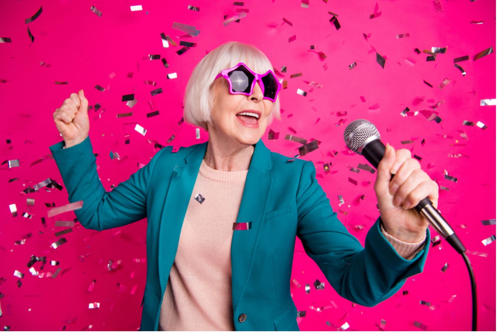 A woman wearing star shaped glasses