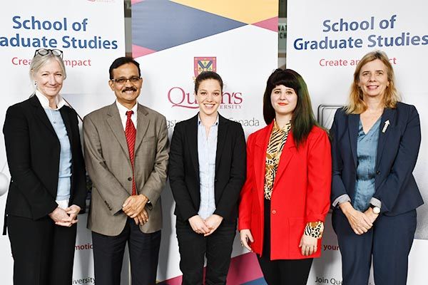 Graduate students Amanda Brissenden, third from left, and Nevena Martinović, fourth from left. Congratulating them are, from left, Barbara Crow, Dean, Faculty of Arts and Science; Fahim Quadir, Vice Provost and Dean School of Graduate Studies; and Sandra den Otter, Associate Vice-Principal (International and Research).