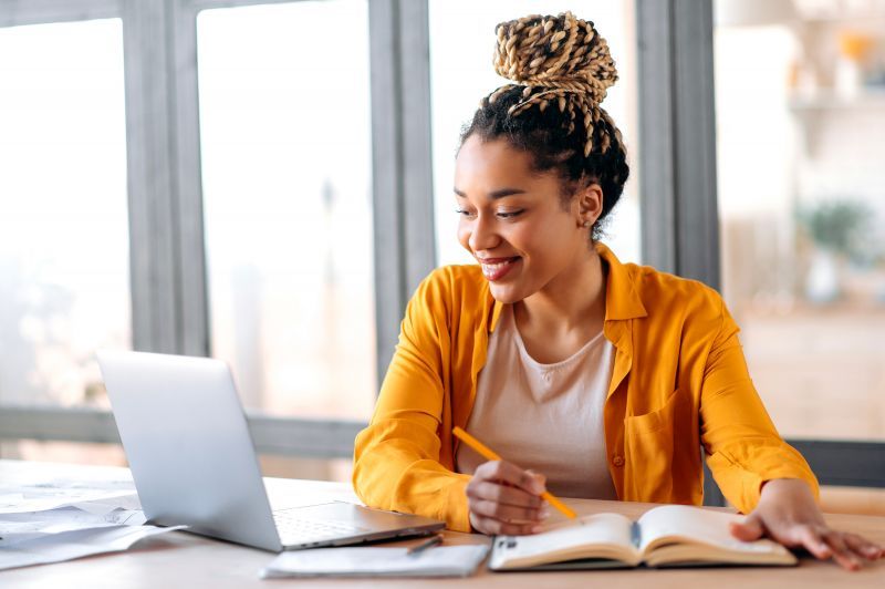 Woman in front of laptop