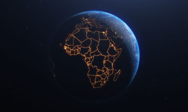 Image of a globe with the continent of Africa outlined in lights