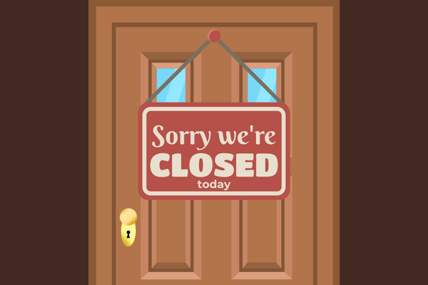Door with a Sorry we're closed sign