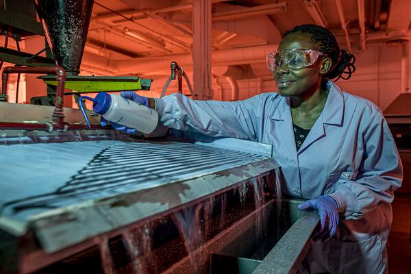 [a researcher working in a lab]