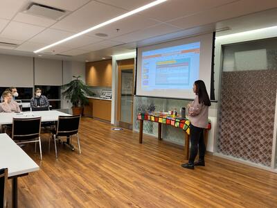 a student speaks to a group of students