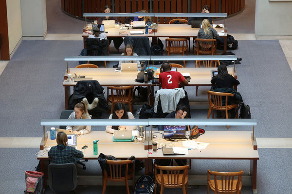Students studying on the first floor of Stauffer Library